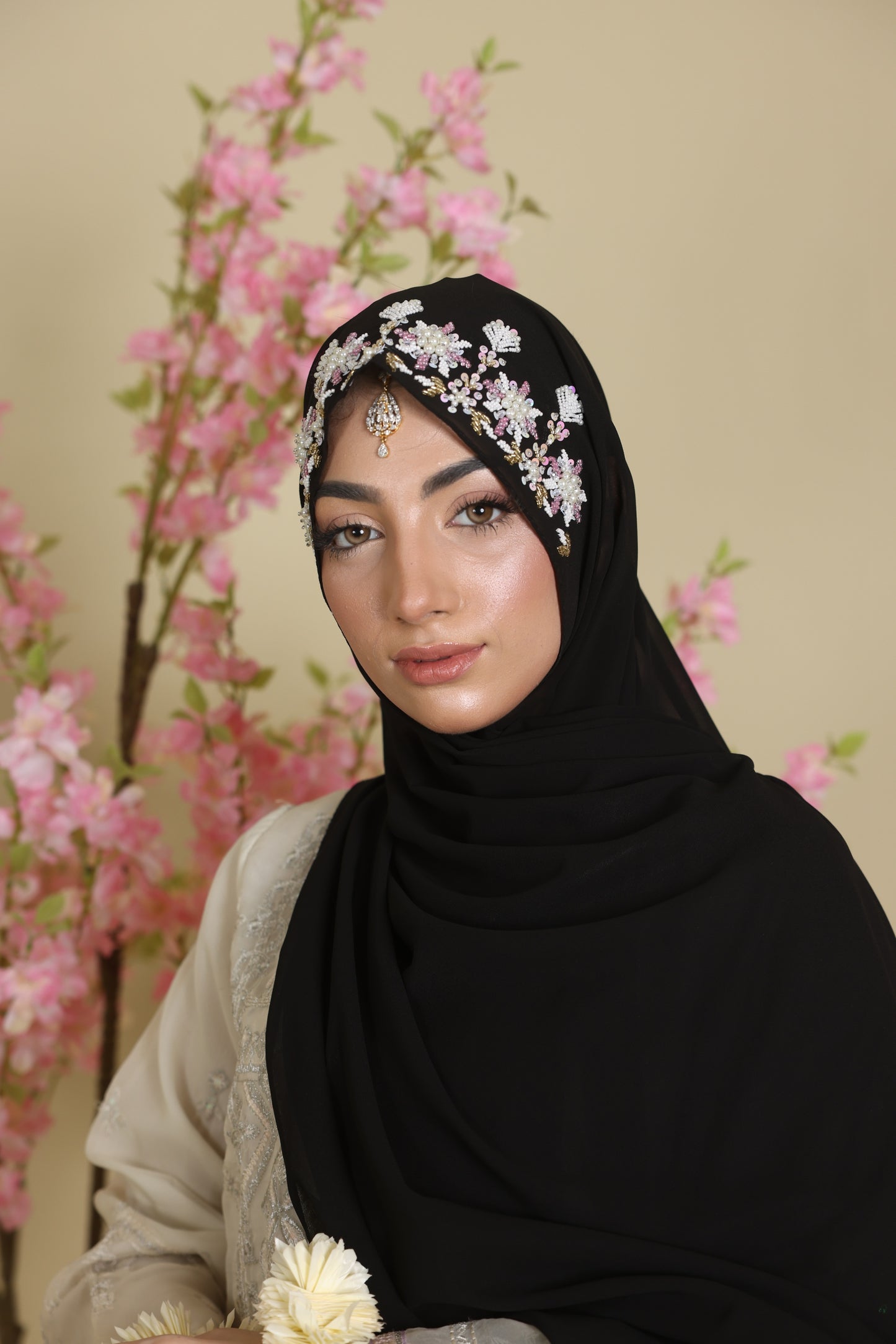 Woman wearing a black hijab in chiffon fancy 